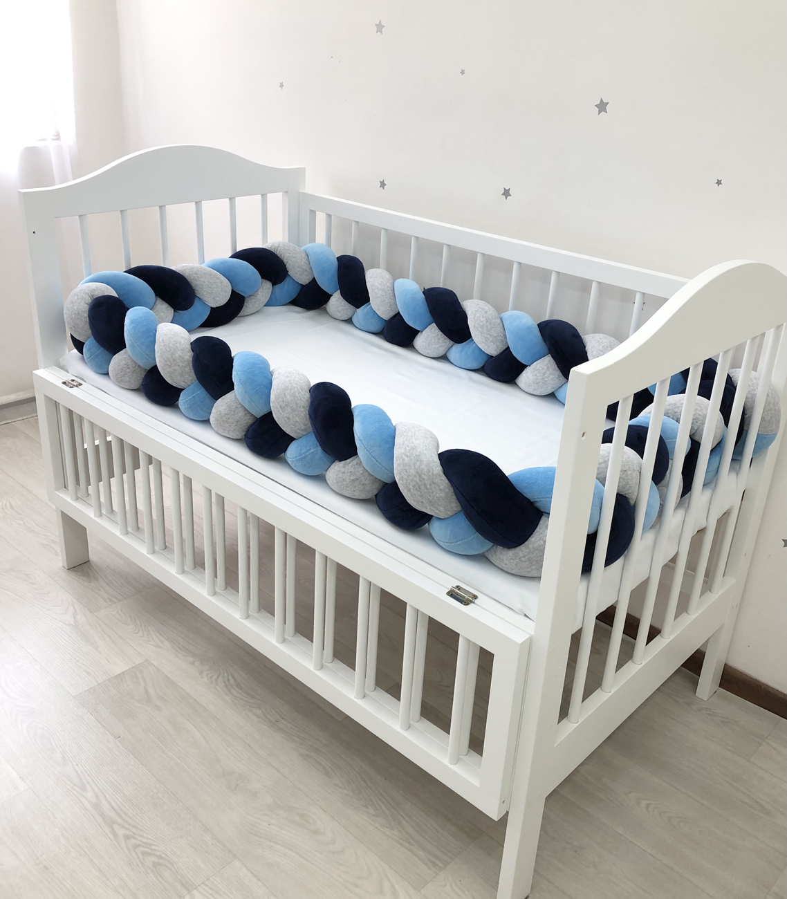 Braided bumper cot. 3-strand knot bumper for the cradle