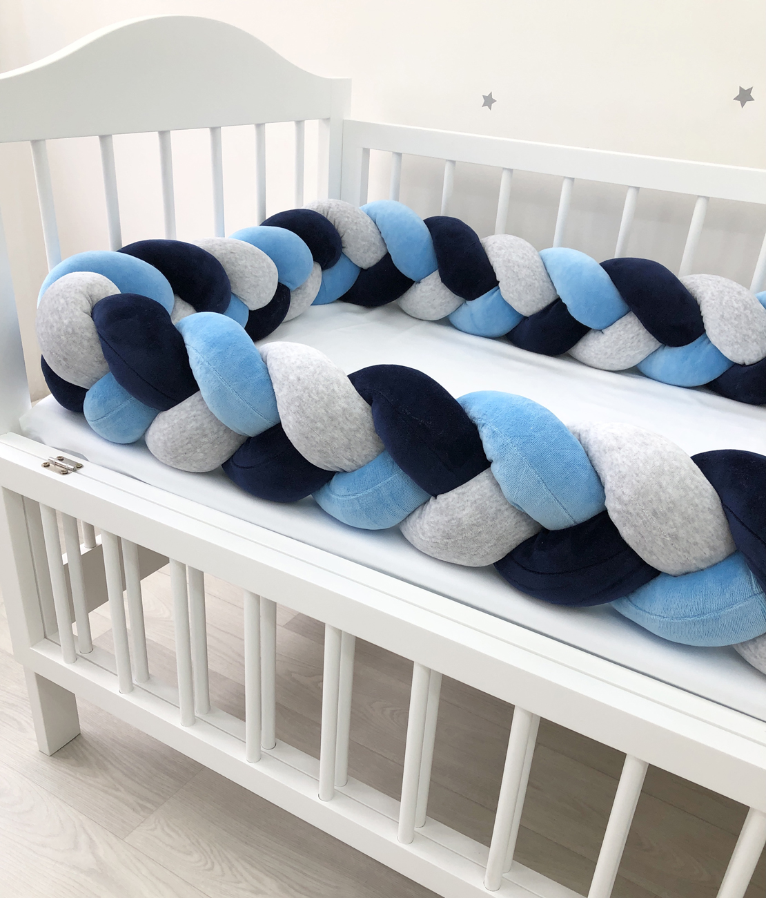 Braided bumper cot. 3-strand knot bumper for the cradle