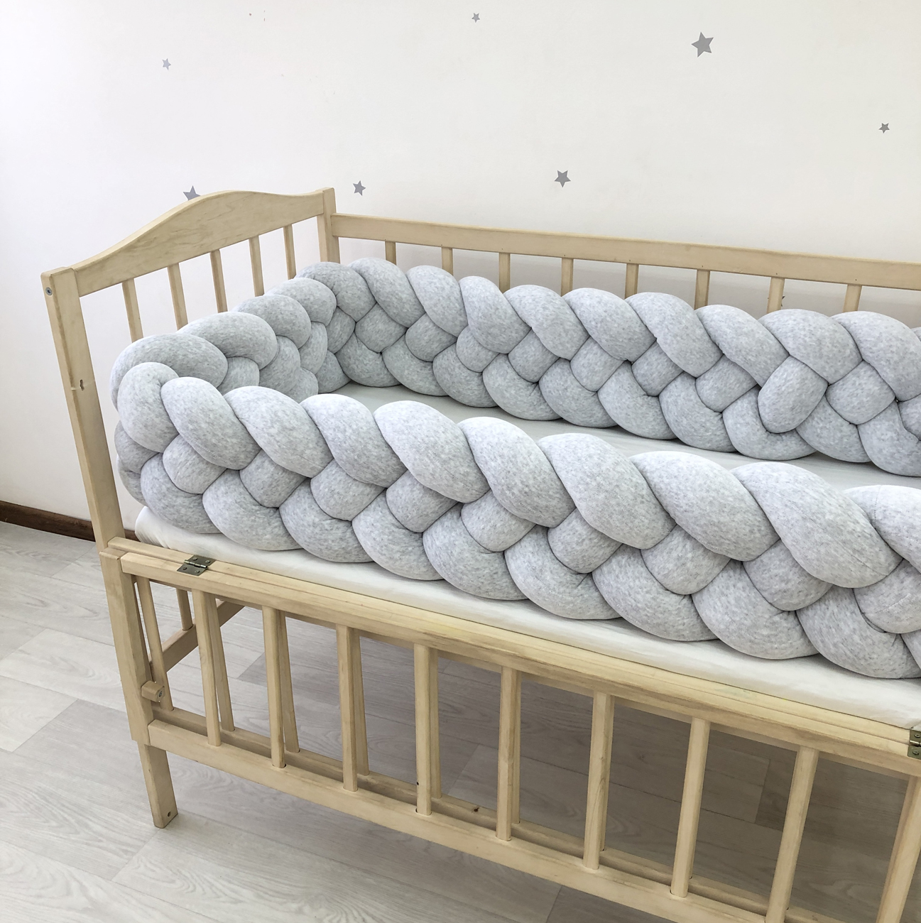 Gray braided crib bumper