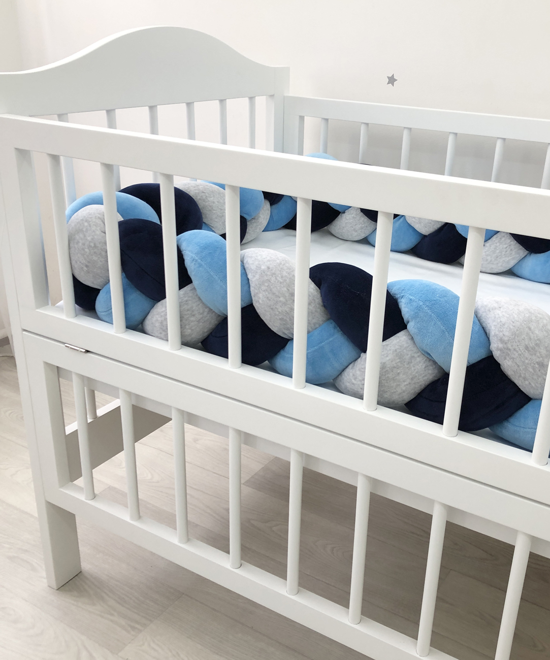 Braided bumper cot. 3-strand knot bumper for the cradle
